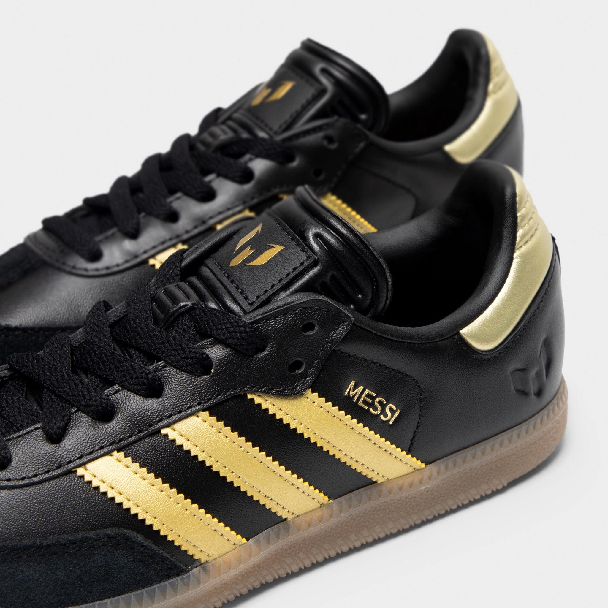adidas Juniors' Samba Messi Core Black / Gold Metallic - Gum Neutral Stance Platform Energy Return Midsoles