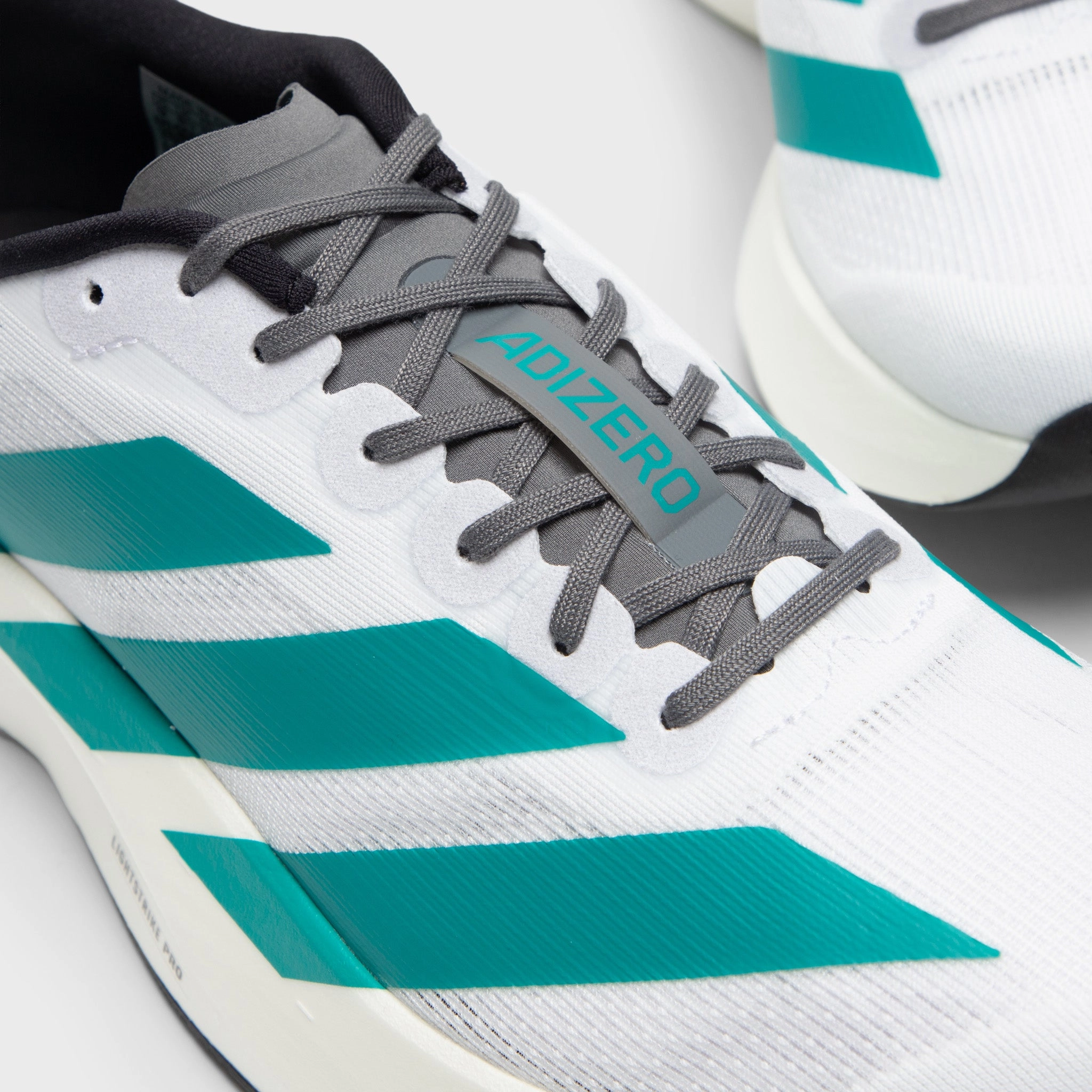 adidas Evo SL White / Teal - Black Trail Performance