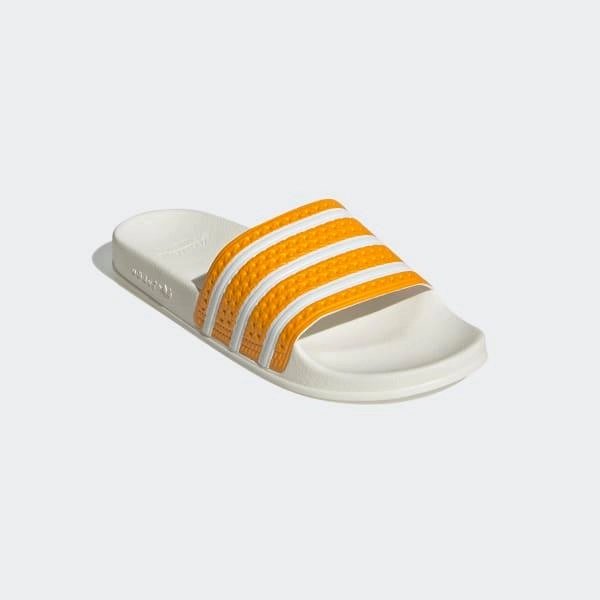Unique cushioning Recycled Rubber Compound Adidas Men's Adilette Slides - Team College Gold / Cloud White / Off White