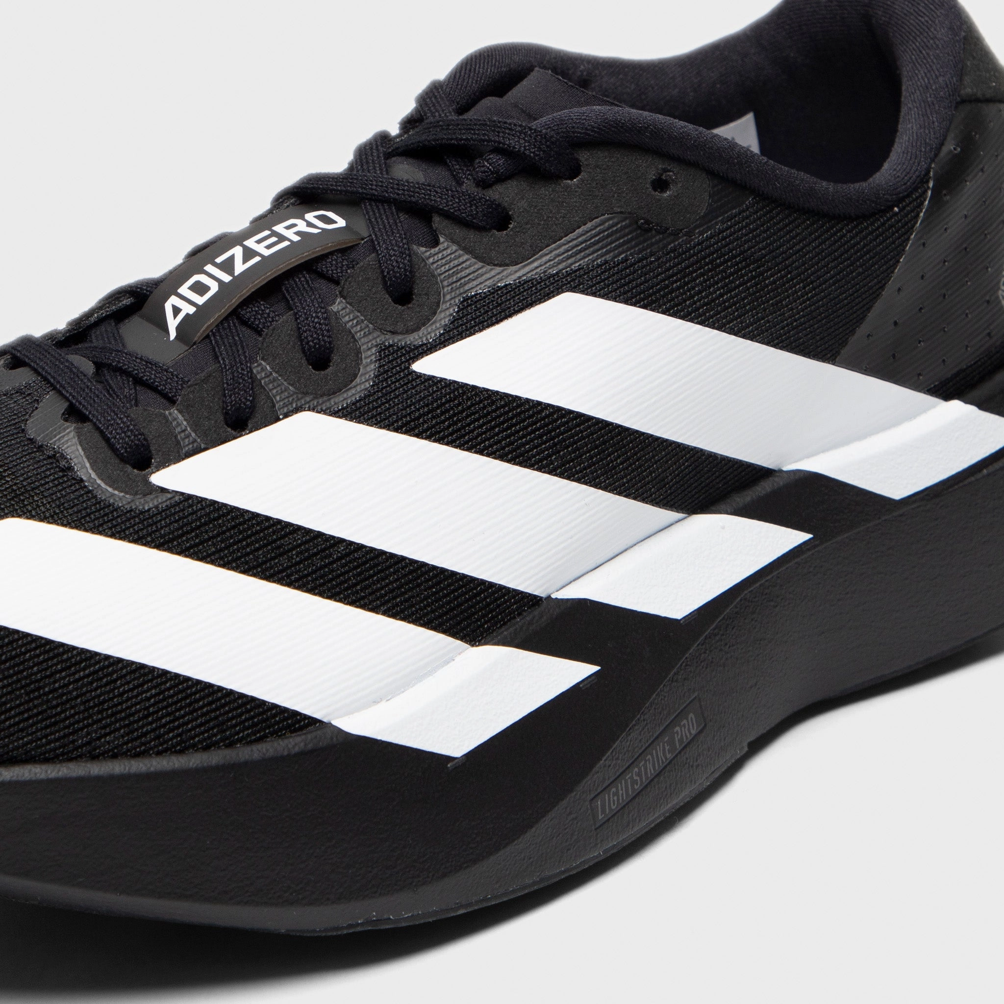 adidas Junior's Adizero Evo SL Black / White - Carbon Flexible Groove Design