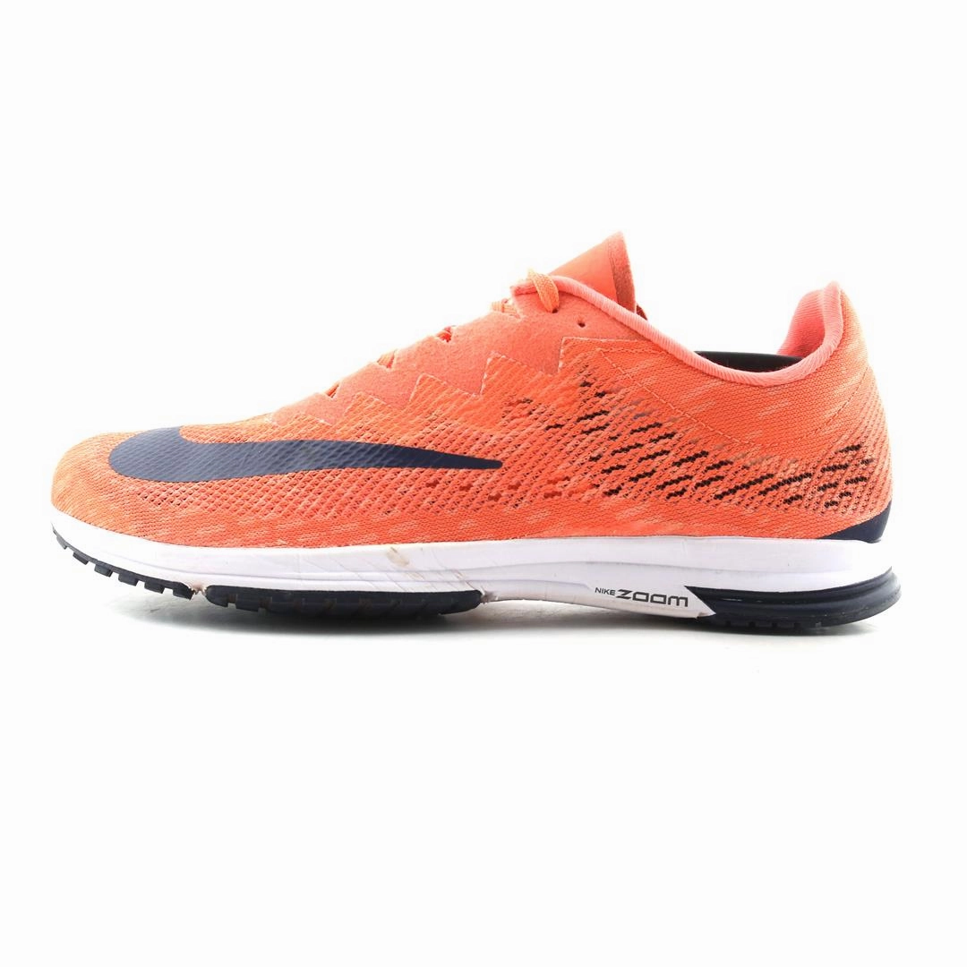 Trendy Accessory running on a wooden track shoes NIKE AIR ZOOM STREAK LT 4