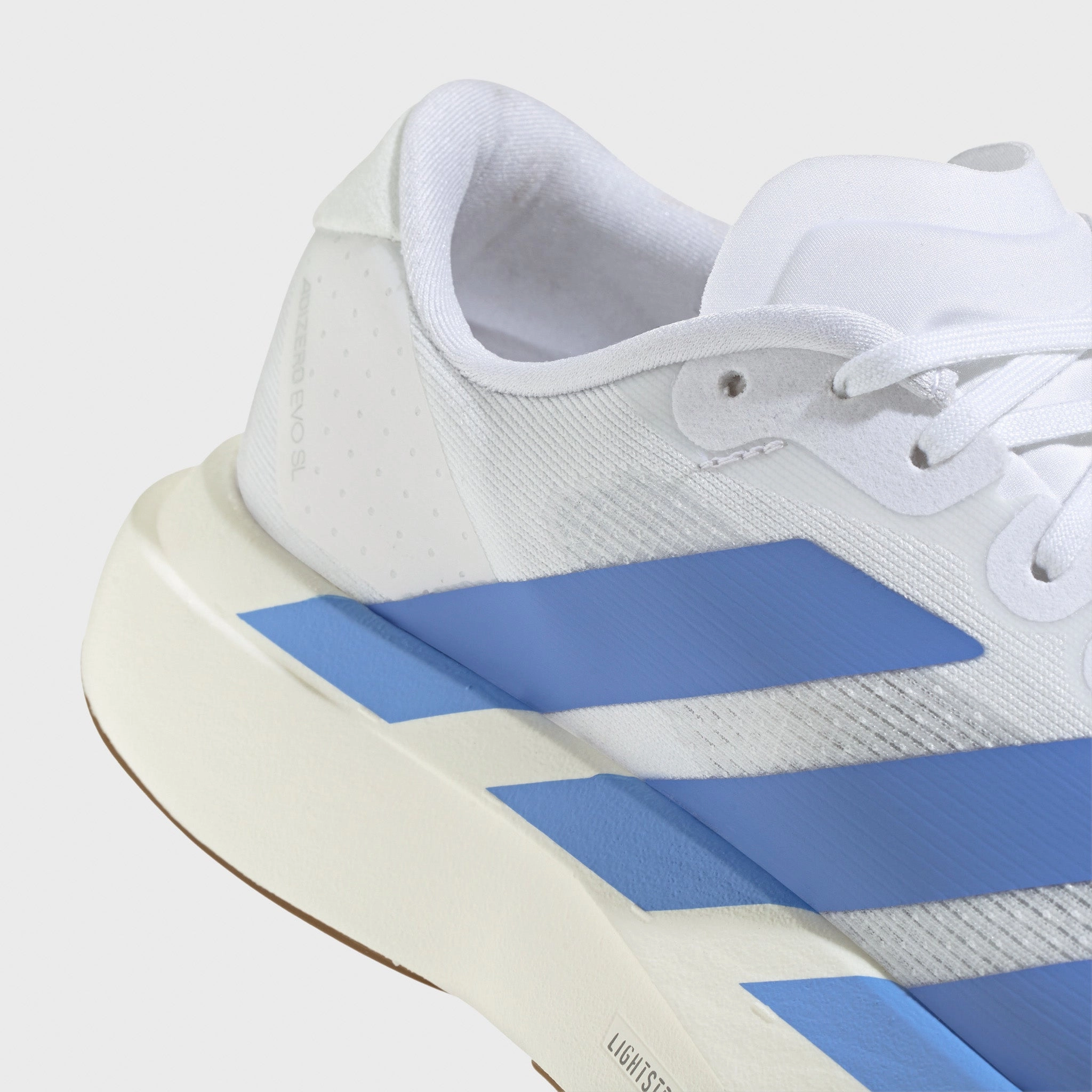 adidas Women's Adizero EVO SL White / Blue Fusion - Off White Lightweight Fit TPU Stabilizer