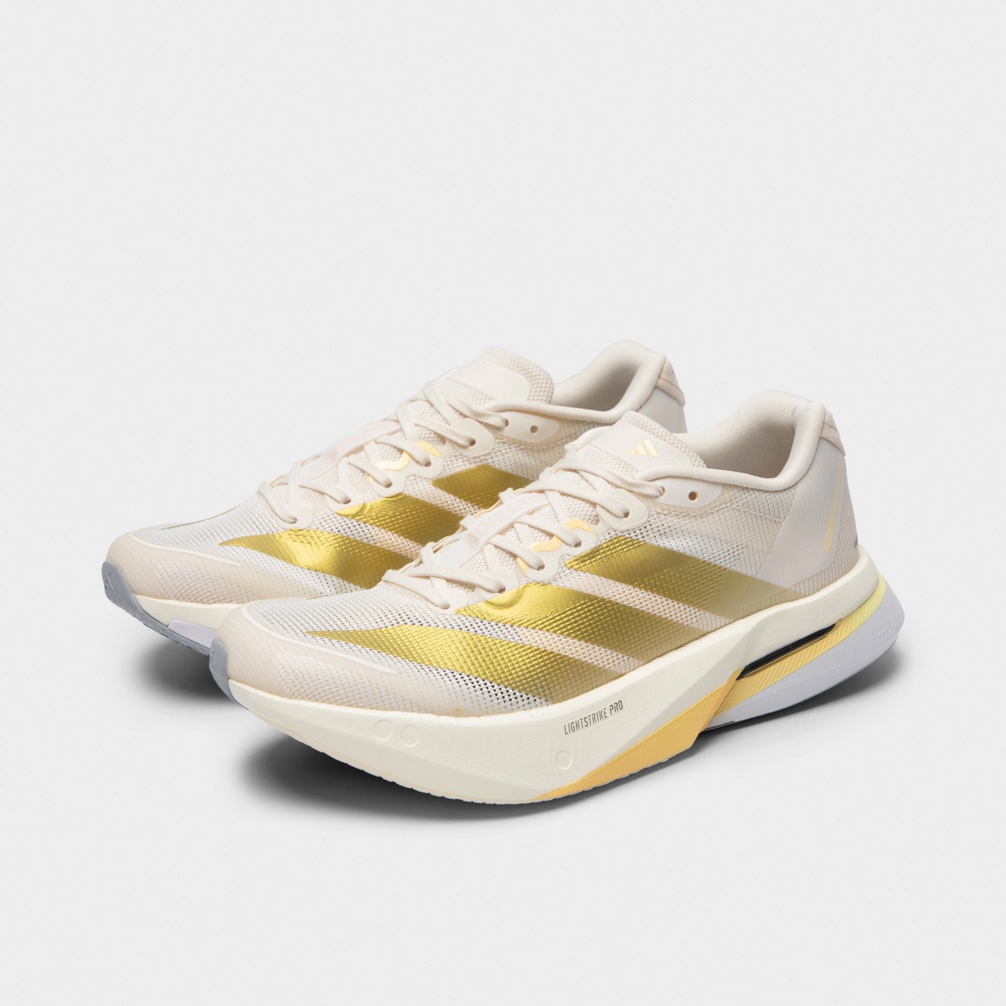 adidas Women's Adizero Boston 13 Chalk White / Gold Metallic - Orange Tint Responsive Use