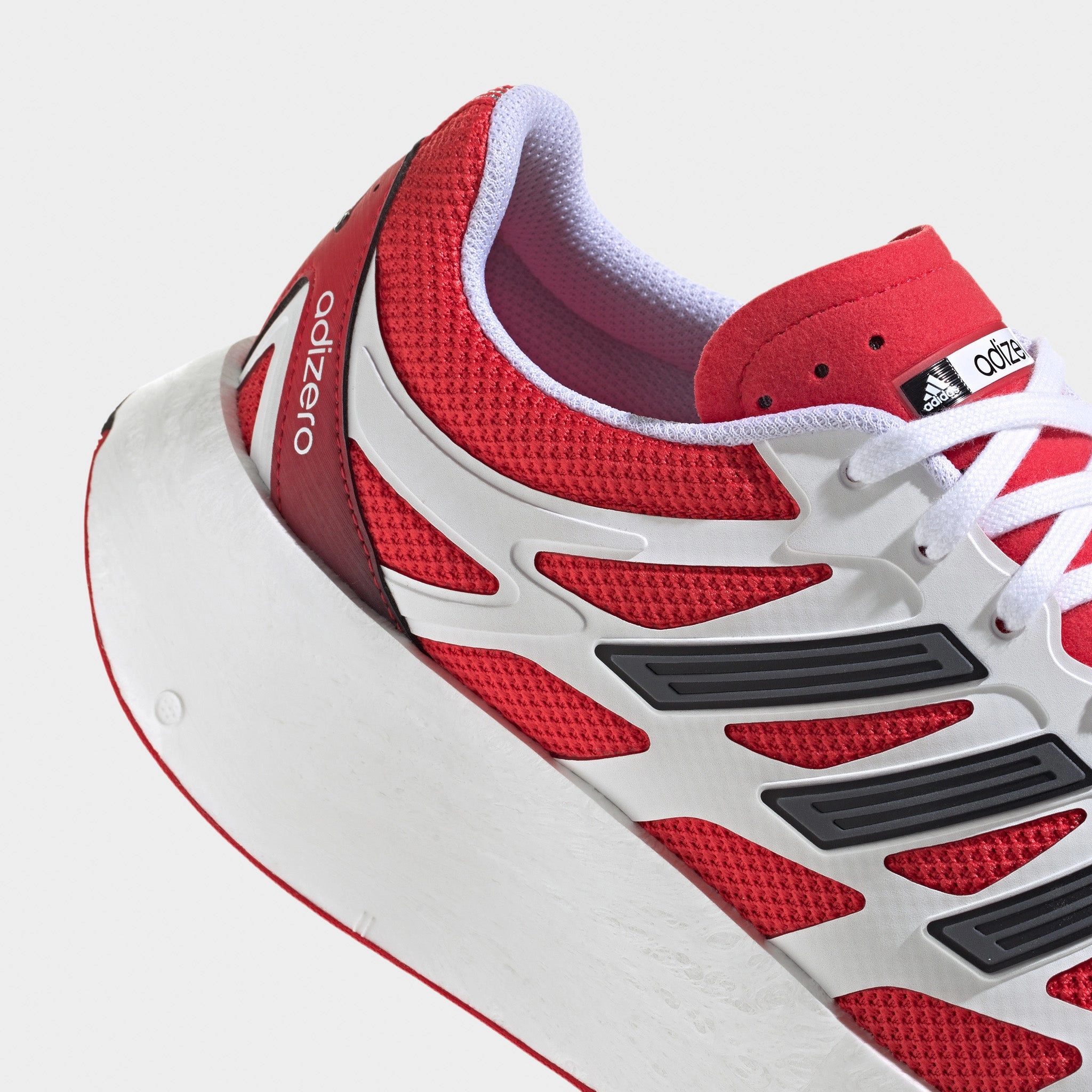 Energy Return Tech adidas Adizero Aruku Footwear White / Pure Ruby - Core Black